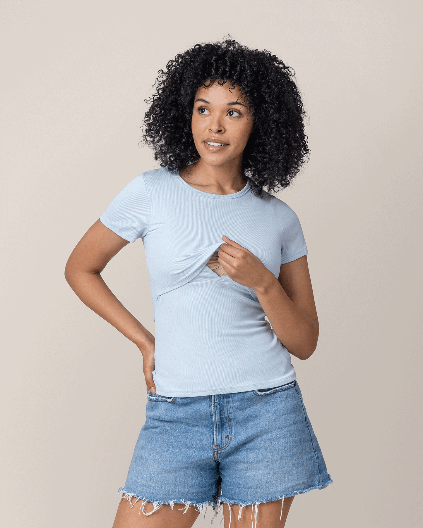 Front view of model wearing Ribbed Bamboo Crew Neck Nursing T-shirt in French Blue, showing nursing access