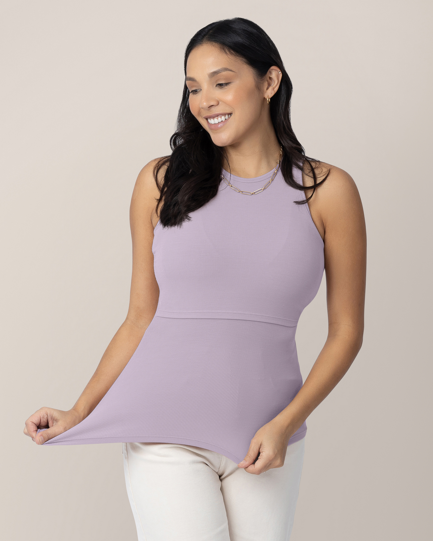 Front view of model wearing the Ribbed Bamboo Racerback Nursing Tank in Lavender Mist, showing stretch of fabric