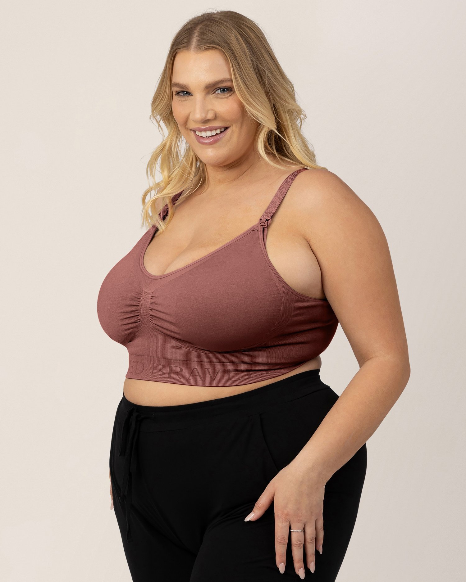 Model wearing the Simply Sublime® Nursing Bra in Redwood with her hand on her thigh. @model_info:Lauren is wearing an X-Large Busty.