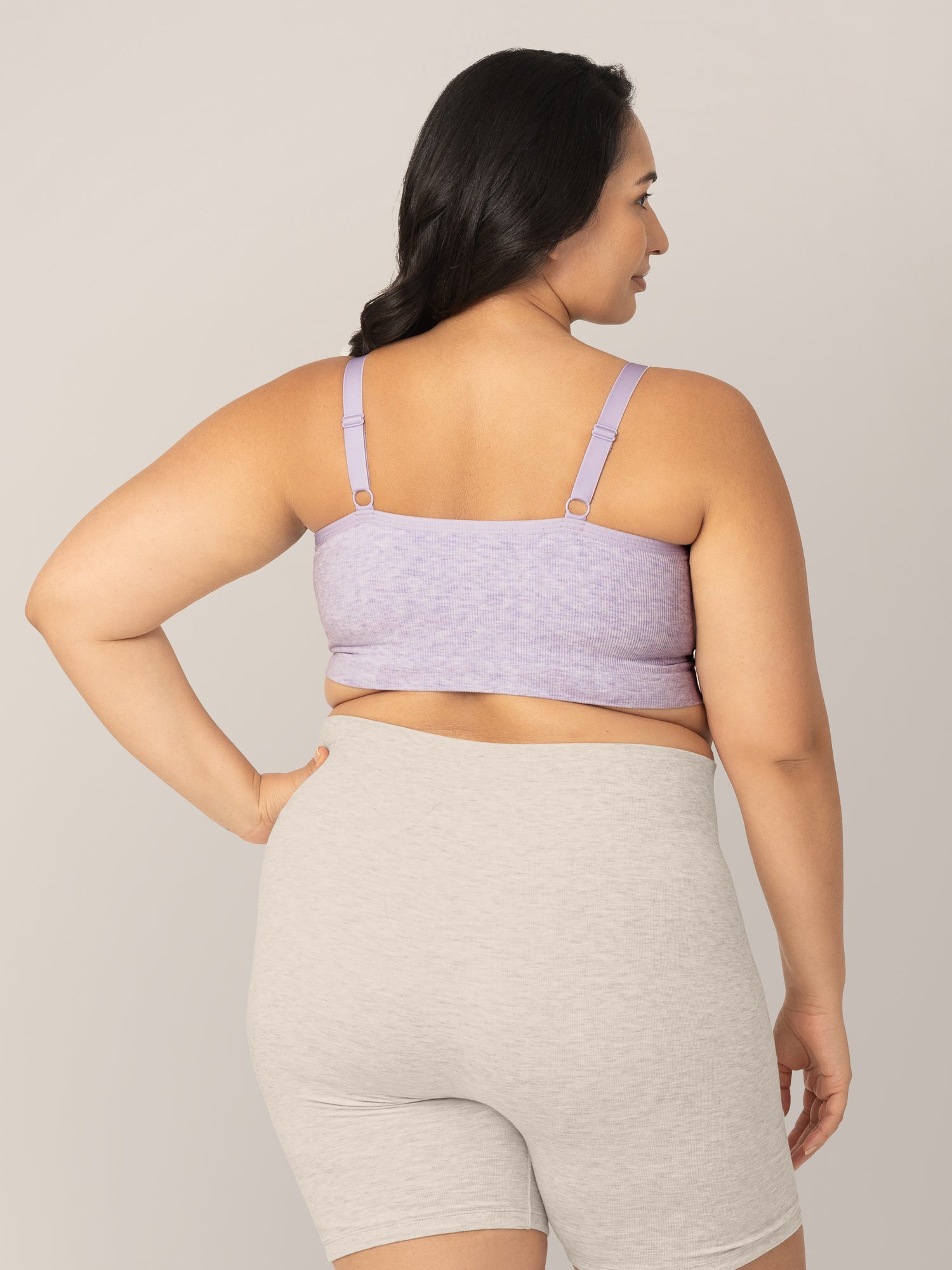 Back view of model wearing the Sublime® Bamboo Hands-Free Pumping Lounge & Sleep Bra in Lavender Heather in a busty fit.