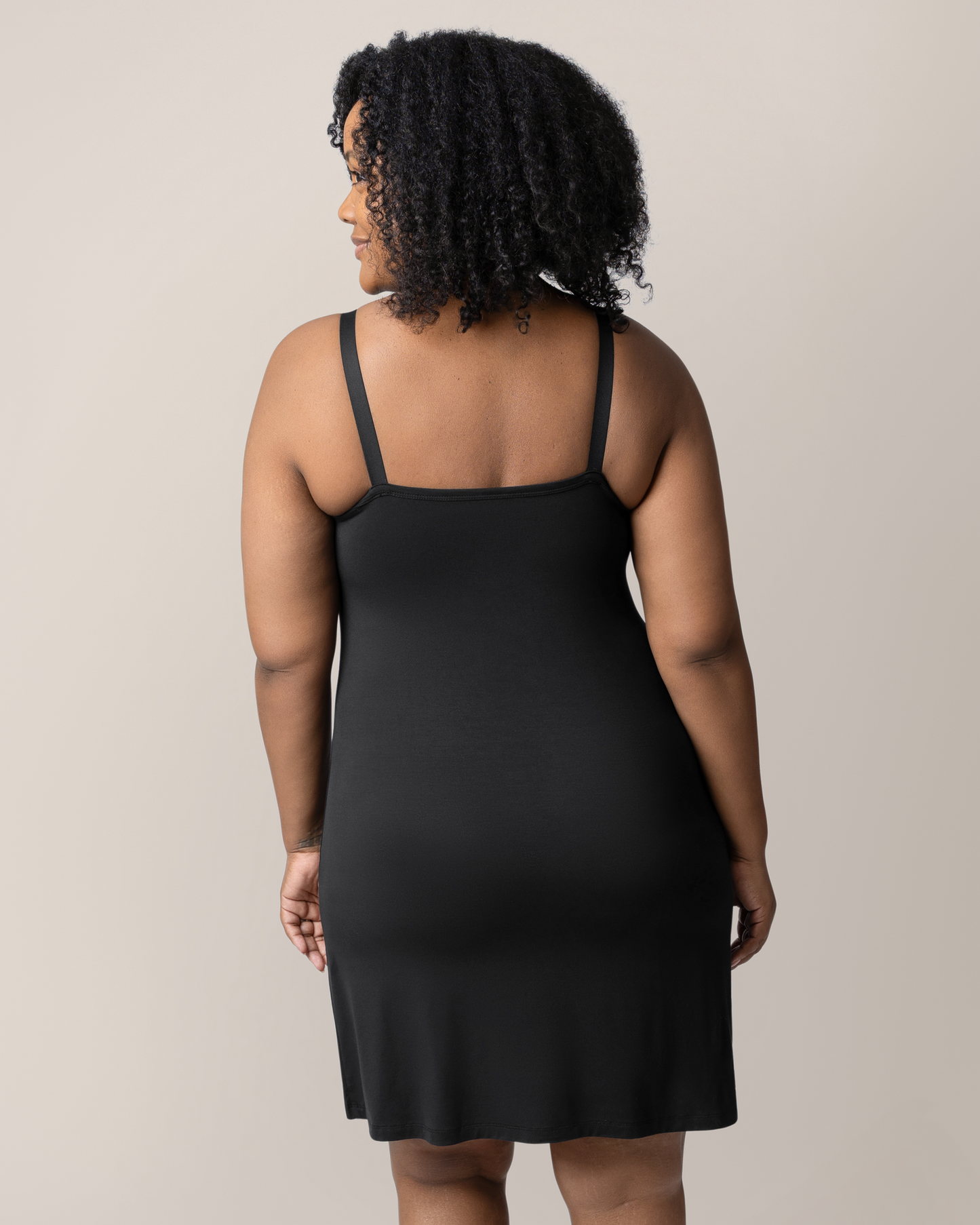 Back view of model wearing the Stella Hands-Free Pumping & Nursing Nightgown in Black