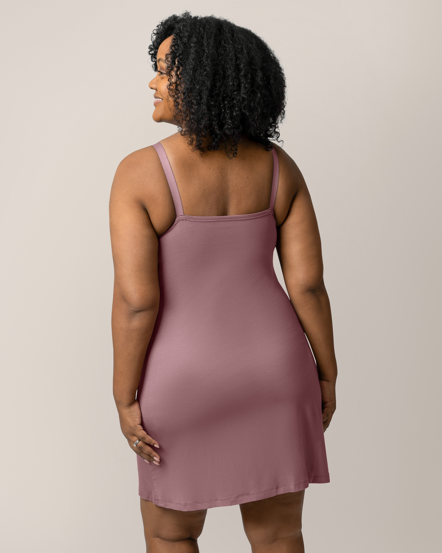 Back view of model wearing the Stella Hands-Free Pumping & Nursing Nightgown in Twilight 