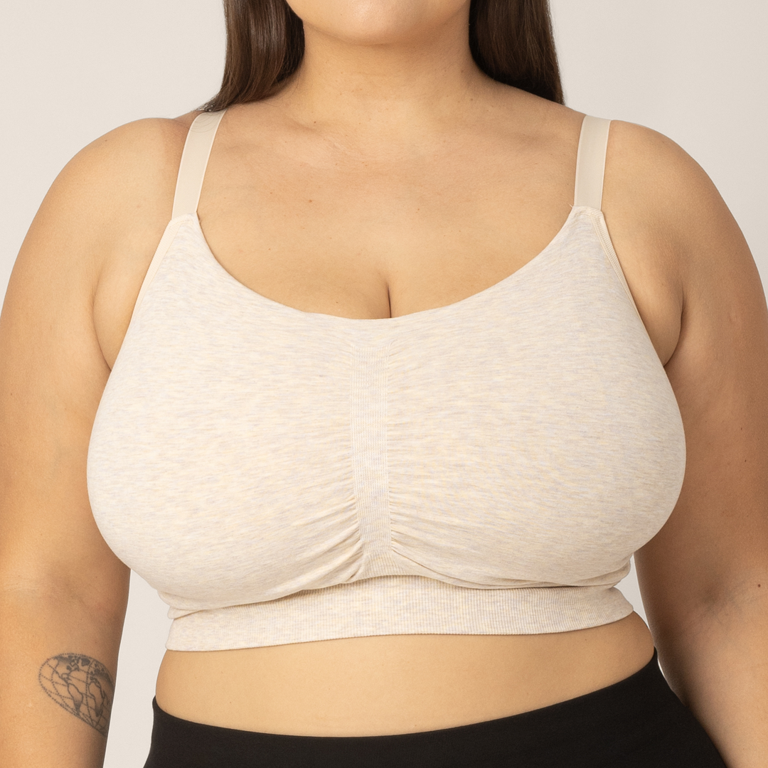 Zoomed in front view of Super busty model wearing the Sublime Hands-Free Pumping & Nursing Sleep and Lounge Bra in Oatmeal Heather.