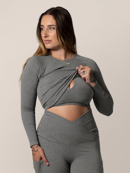 Front view of model wearing the Sublime® Bamboo Maternity & Nursing Cropped Long Sleeve Top in Charcoal, showing nursing access @model_info:Anna is wearing a Small.