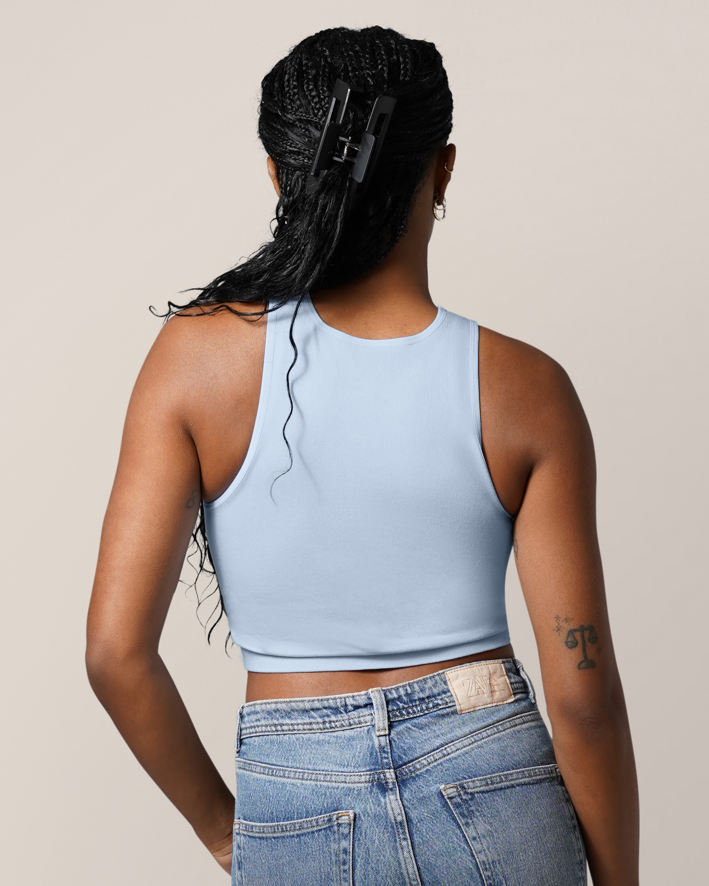 Back view of model wearing the Sublime® Bamboo Hands-Free Pumping Longline Bra Top in French Blue