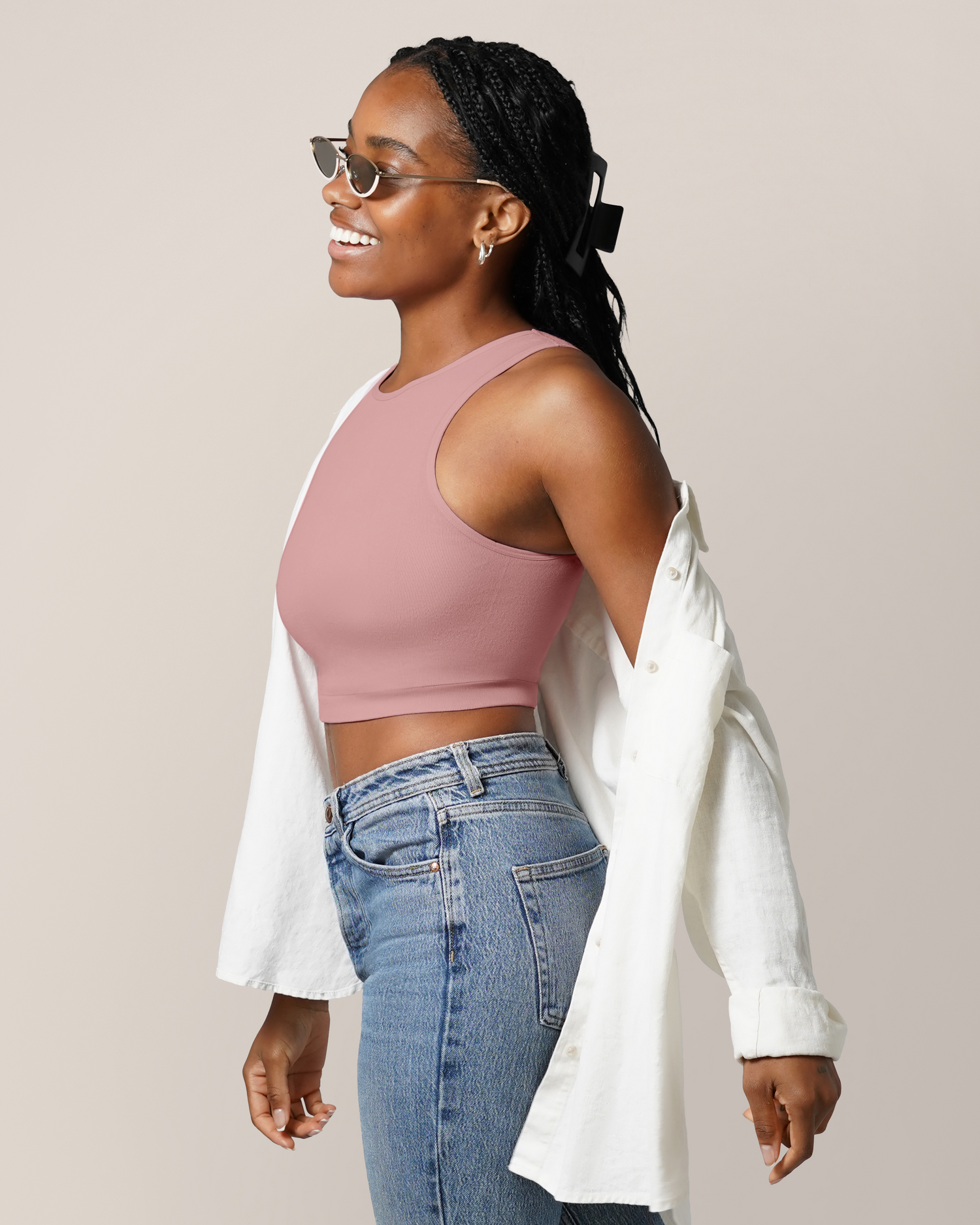 Side view of model wearing the Sublime® Bamboo Hands-Free Pumping Longline Bra Top in Light Mauve, paired with open button-down shirt and jeans