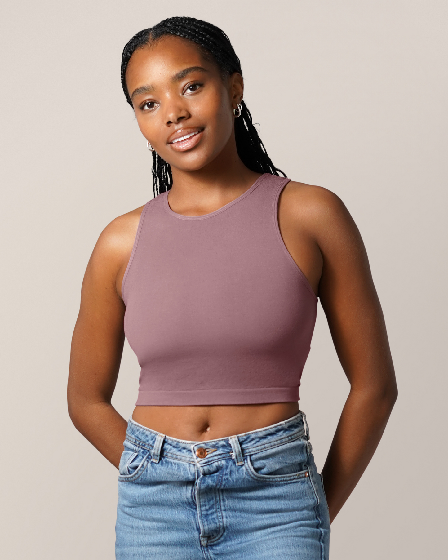 Front view of model wearing the Sublime® Bamboo Hands-Free Pumping Longline Bra Top in Twilight, paired with jeans @model_info:Josie is wearing a Small Busty.