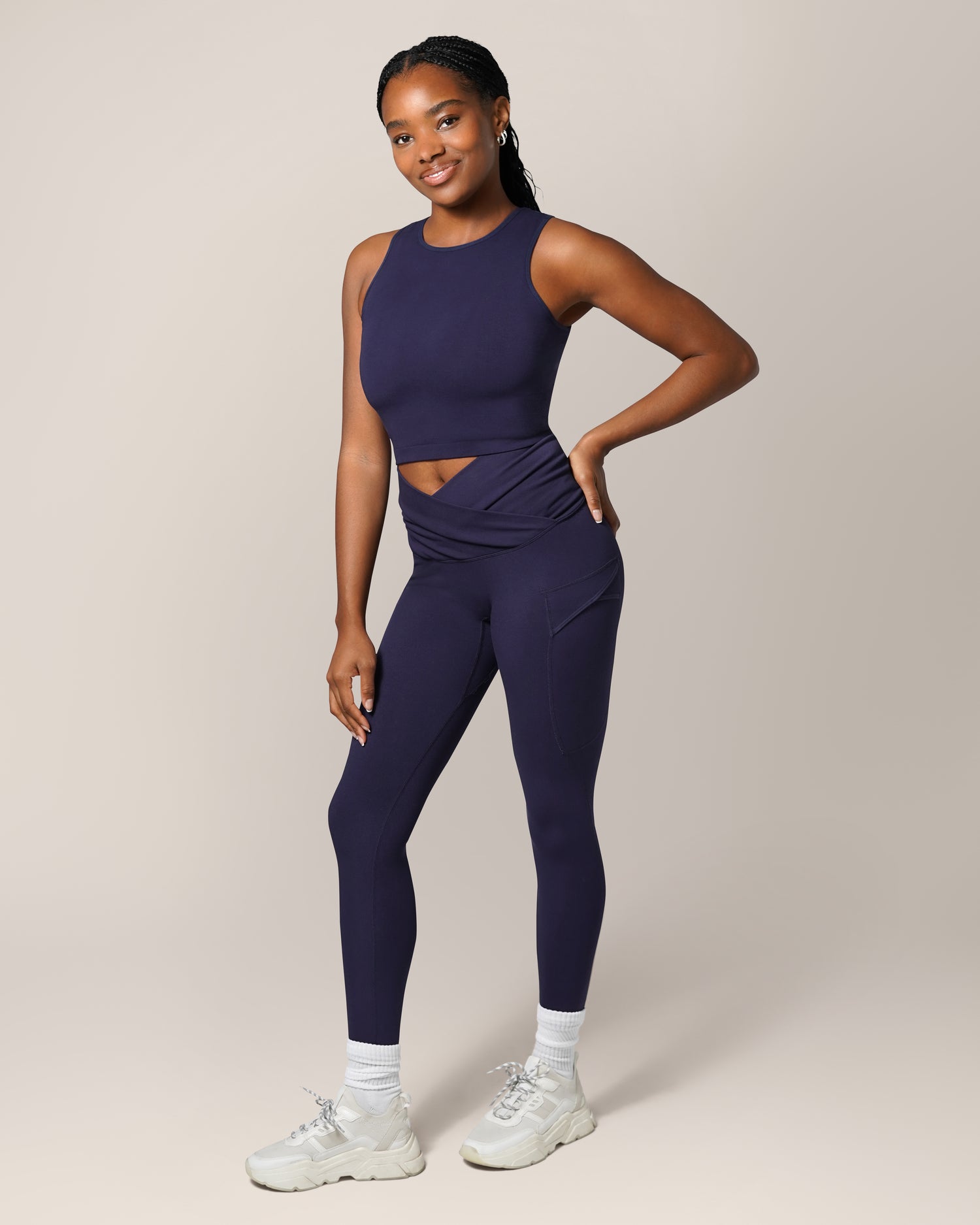 Front view of model wearing the new Sublime® Bamboo Maternity & Nursing Longline Bra Top in Navy, paired with matching Sublime® Bamboo Maternity & Postpartum Crossover Legging @model_info:Josie is 5'6" and wearing a Small.