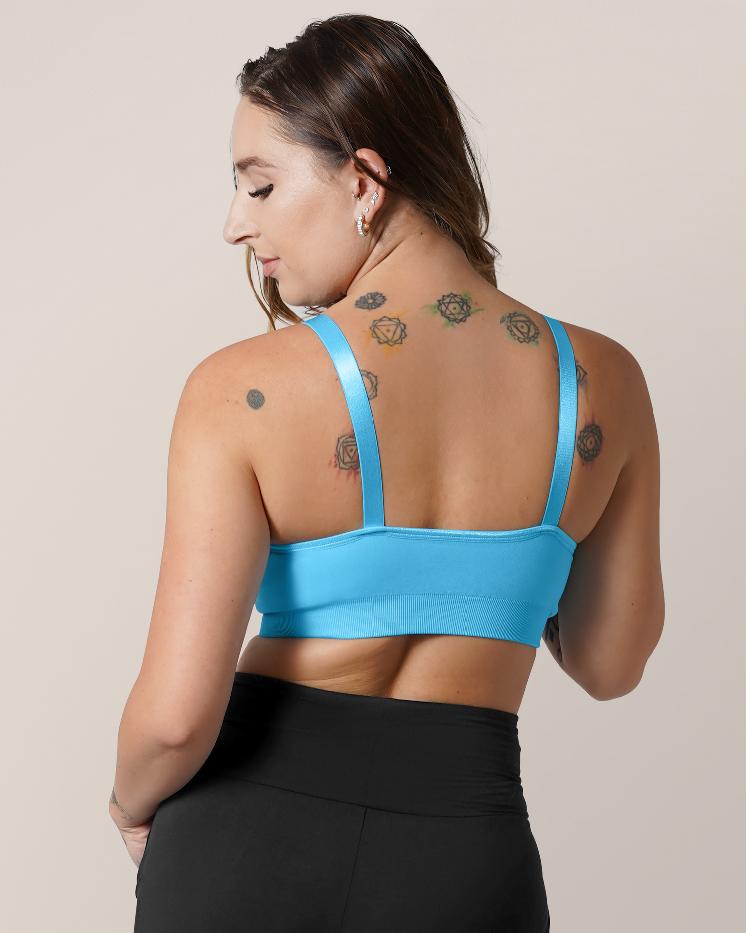 Back view of model wearing the Tatum Seamless Maternity & Nursing Bralette in Blue Lagoon